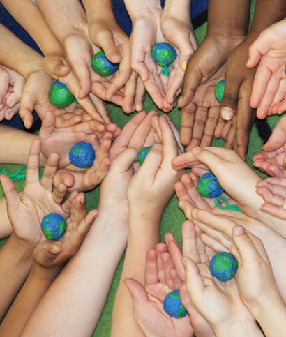 childrens-hands-in-circles